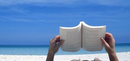 Reading a book on the bea 001